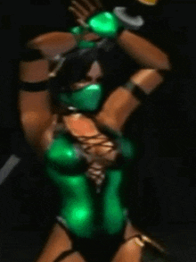 a blurred image of a woman in a green outfit with a mask on .