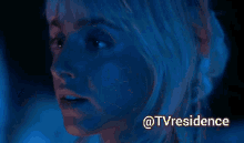 a close up of a woman 's face with the words " vamos " below it