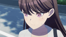 a close up of a girl with long hair and purple eyes