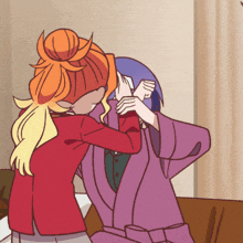a cartoon drawing of a woman hugging another woman in a purple robe