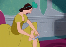 a cartoon of a woman in a yellow dress with a blue bow