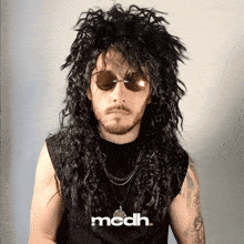 a man wearing a wig and sunglasses with the word mcdh on the bottom