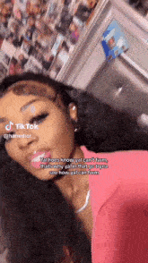 a woman is taking a selfie with a caption that says " ya hoes know yal can 't fvm "