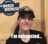 a person wearing a hat that says i 'm exhausted on it