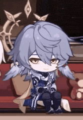 a cartoon character is sitting on a red couch with a stuffed animal .