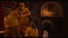 a group of cartoon characters are standing in a dark room with candles and a sign that says kimcartoon