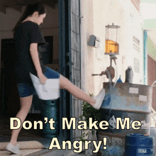 a woman kicking a towel with the words " don 't make me angry " written on the bottom