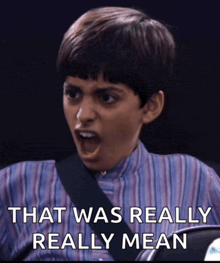a boy with his mouth open and the words that was really really mean