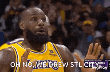 a basketball player with a beard is making a funny face during a game while wearing a yellow jersey .