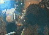 a blurry picture of a person with the letter c on the bottom