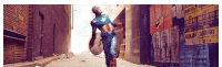 a man in a captain america costume walking down a street