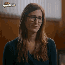 a woman wearing glasses with the words stay tooned on the bottom