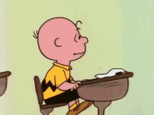 Charlie Brown Studying Cartoons GIF - Charlie Brown Studying Charlie Brown Cartoons GIFs