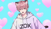 a boy wearing a hoodie that says zox is waving