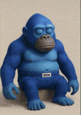a blue gorilla with the word ron on his pants