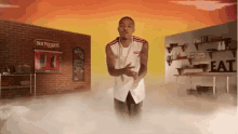 a man dancing in front of a hot pockets restaurant
