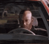 a man in a black shirt with a badge on his arm