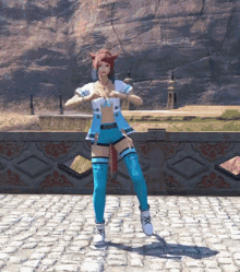 a girl in a video game is dancing on a cobblestone street .