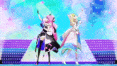 a couple of anime girls standing on a stage