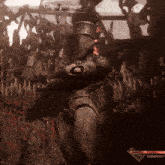 golgra gets angry while standing in front of a group of people