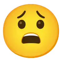 a yellow smiley face with a surprised expression on it