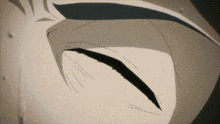a black and white drawing of a person 's face with a tear coming out of it .
