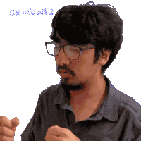 a man with glasses and a beard has the number 2 in the corner