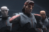 a group of soldiers in armor are standing next to each other .