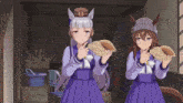 a couple of anime girls standing next to each other holding their hands together