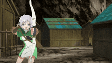 a girl in a green dress is holding a bow and arrow in her hand