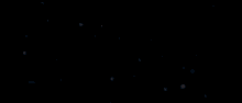 a computer screen shows a glowing object in the middle of a dark room