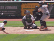 a baseball game is being played in front of a nbc sports bay area banner