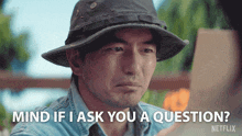 a man in a hat says mind if i ask you a question netflix