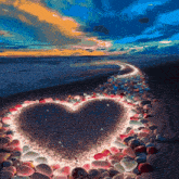a heart made of rocks on a beach