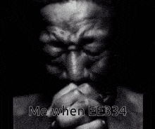 a black and white photo of a man with the words " me when ee334 " on the bottom