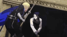 two men are standing next to each other in a doorway holding a spear .