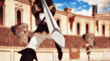 a man is holding a sword in front of a large building