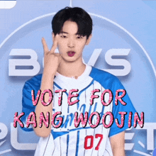 a boy in a blue and white jersey says vote for kangwoojin 07