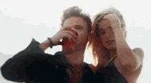 Drinking Fixing Hair GIF - Drinking Fixing Hair Couple GIFs