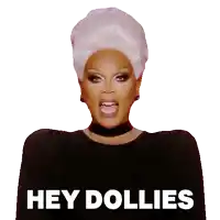 a drag queen says " hey dollies " in white letters