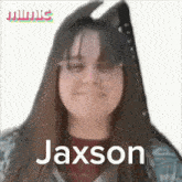 a close up of a woman 's face with the name jaxson on the bottom .