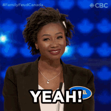 a woman says yeah in front of a cbs logo