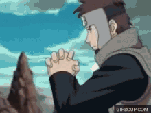 a gif of a man praying with the website gifsoup.com below him