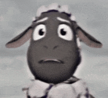 a cartoon sheep is making a sad face .