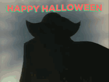 a silhouette of a man in a cowboy hat with the words " happy halloween " behind him