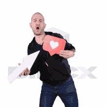 a man is holding an arrow and a red heart shaped speech bubble