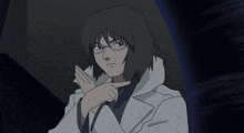 a man with glasses and a white coat is making a stop sign