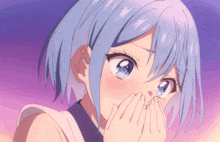 a girl with blue hair covering her face with her hands