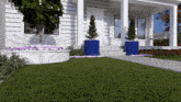 a white brick house with a blue planter in front of it