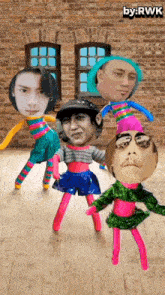 a group of dolls with faces on their heads are dancing in front of a brick wall